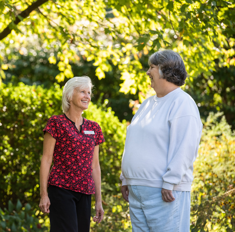 Two women talking outdoors