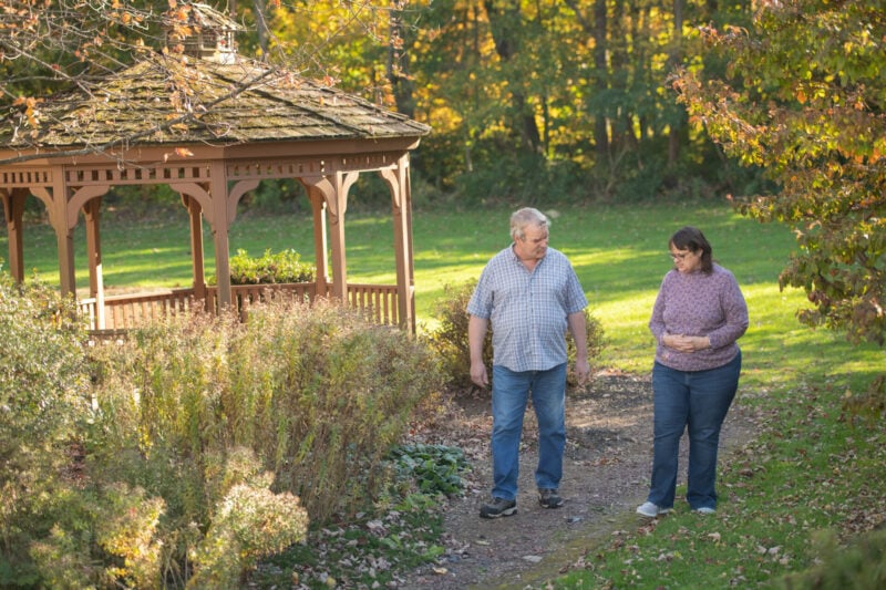 A couple walking by the gazeebo