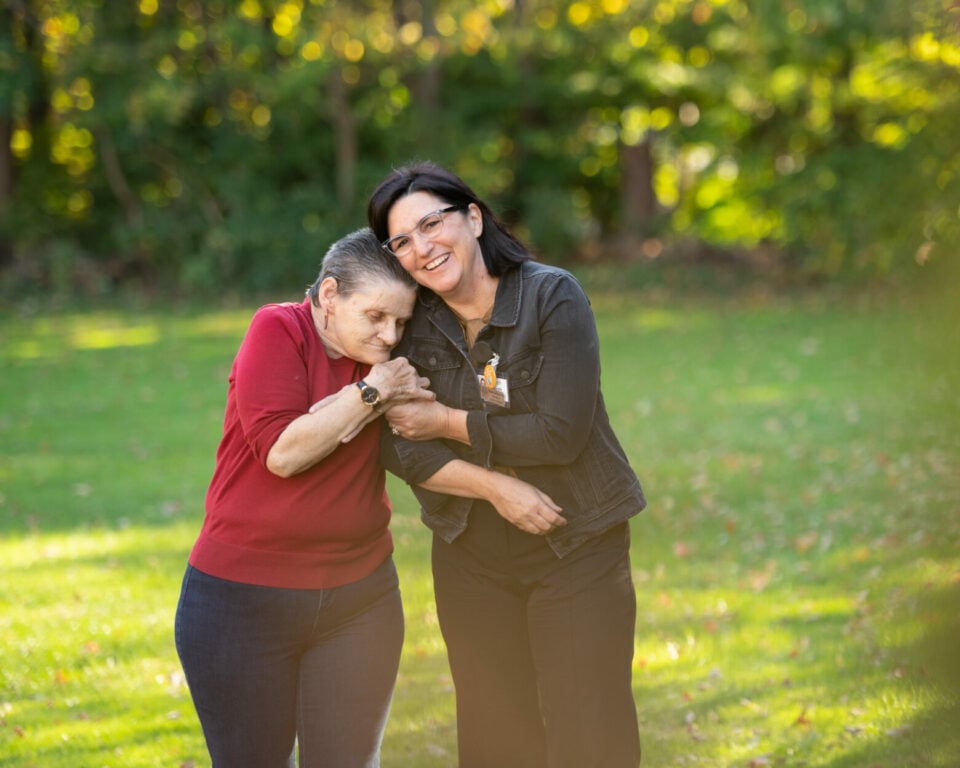 Two women walking outside